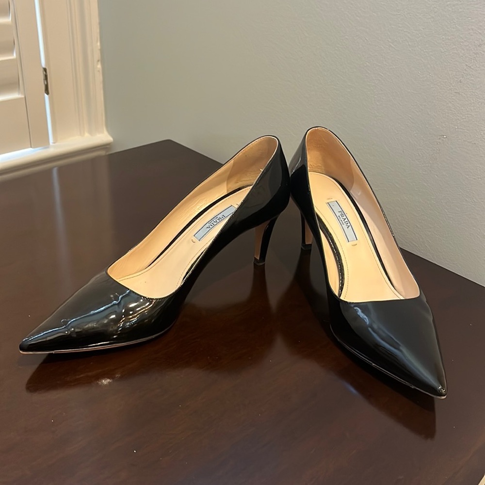Prada Parent Leather Pumps.